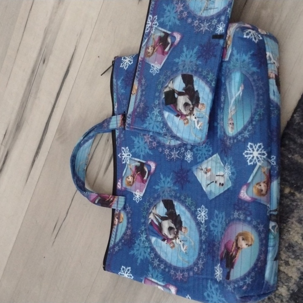 Frozen zippered tote with matching zippered pouch.